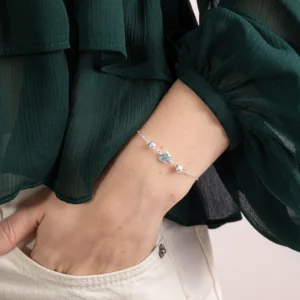 Pulseira Borboleta Azul Clara e Bolas