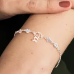 Pulseira de Prata 925 Pontos de Luz e Menino Central