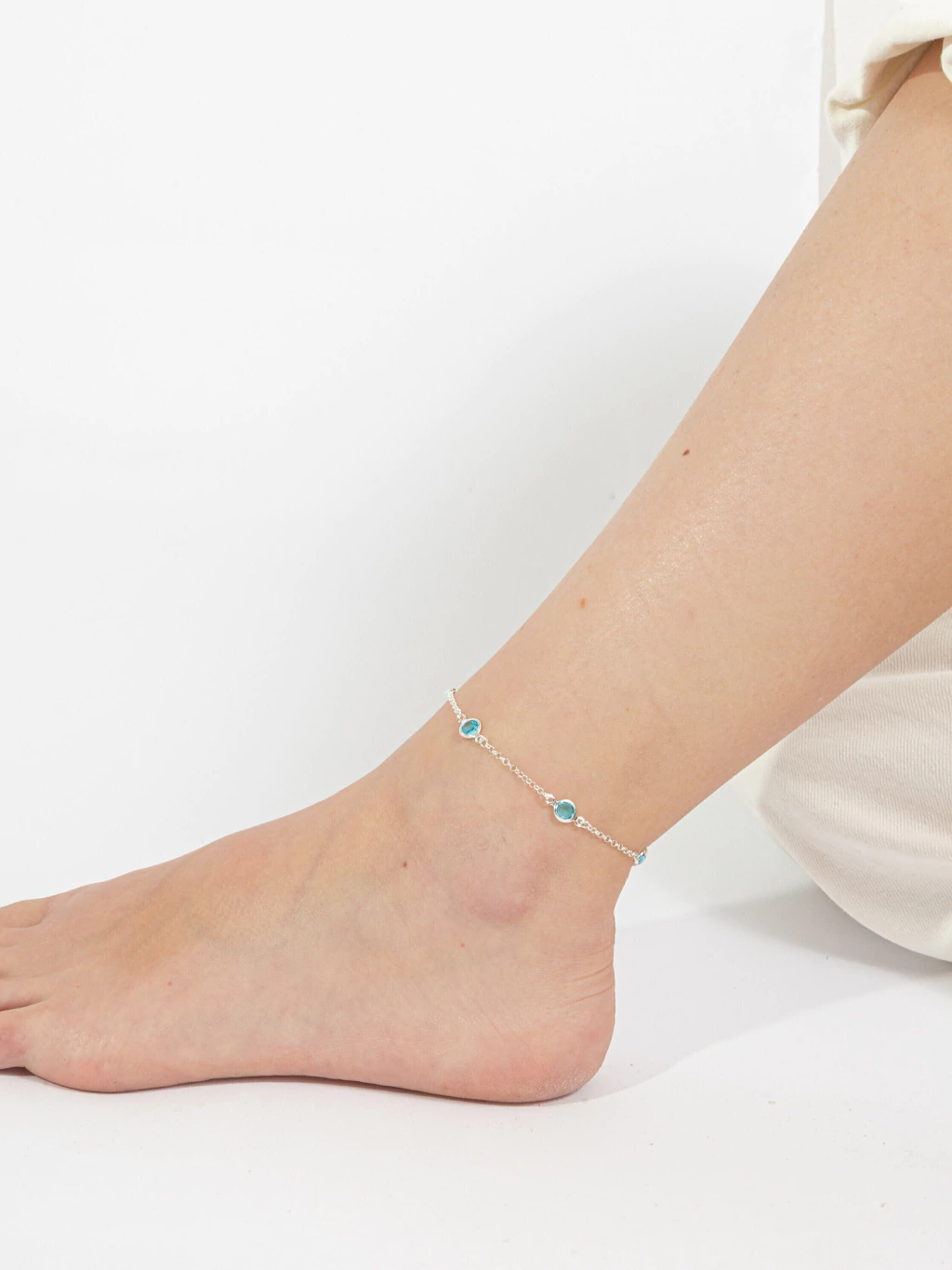 Tornozeleira Zircônias Azuis Claras